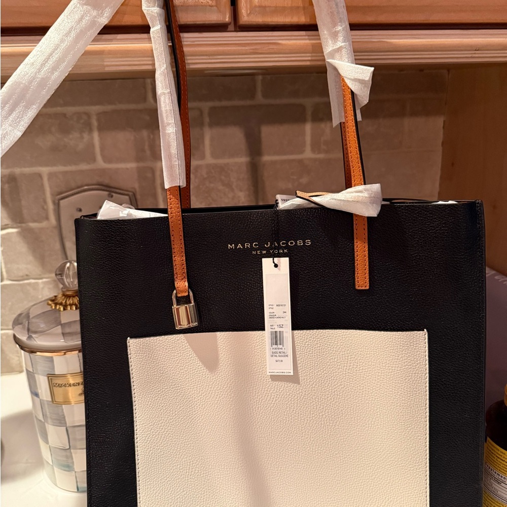 Marc Jacobs Black and White Totes with Minimalist Design